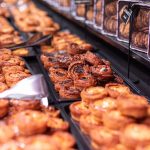 Crafted pastries and cookies on display in a Parisian bakery, evoking the charm of French culinary traditions.